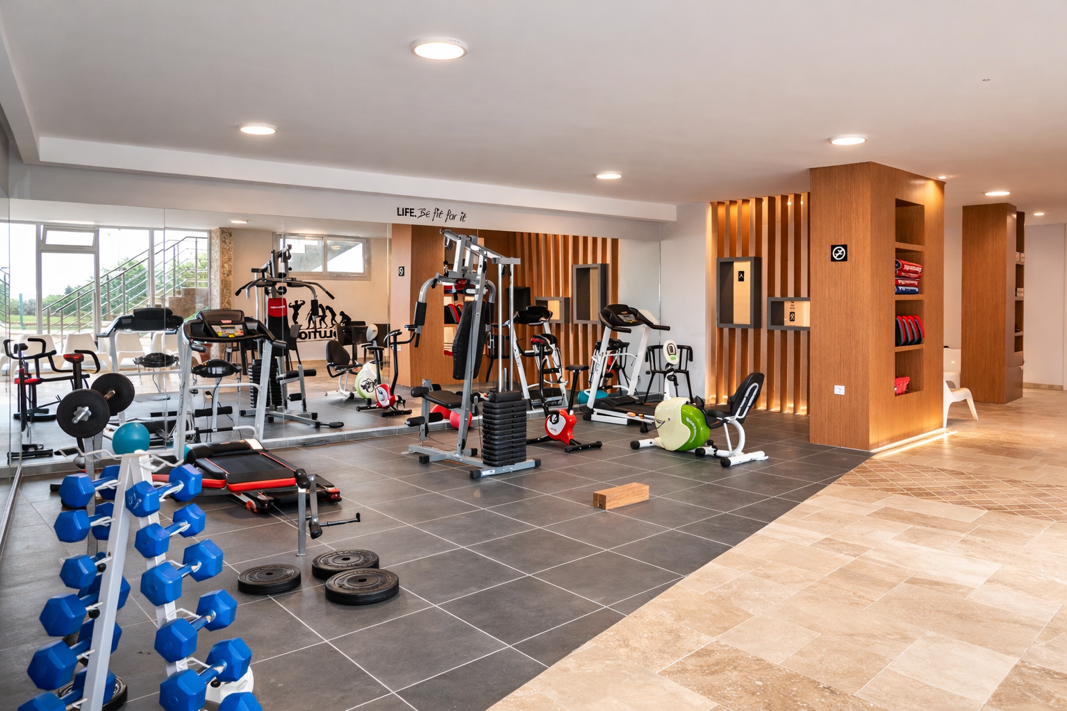 On-site fitness gym with cardio and weight equipment