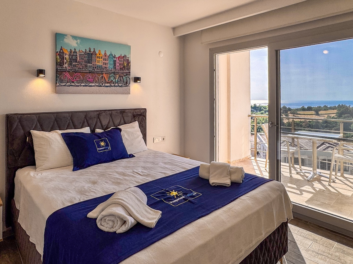 Penthouse master bedroom with sea-view balcony